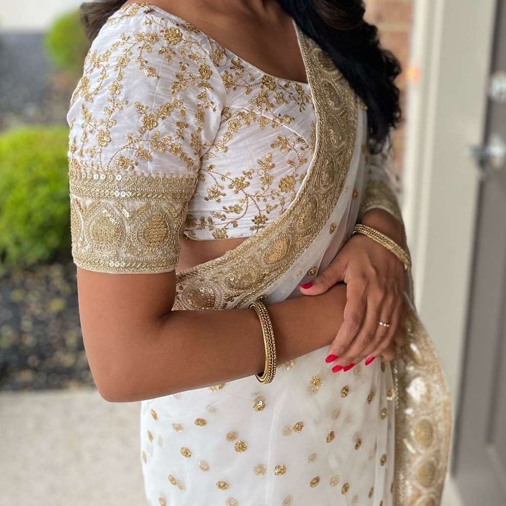 Sabyasachi inspired white and gold net saree with blouse